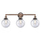 Beacon Bath Vanity Light shown in the Antique Copper finish with a Seedy shade