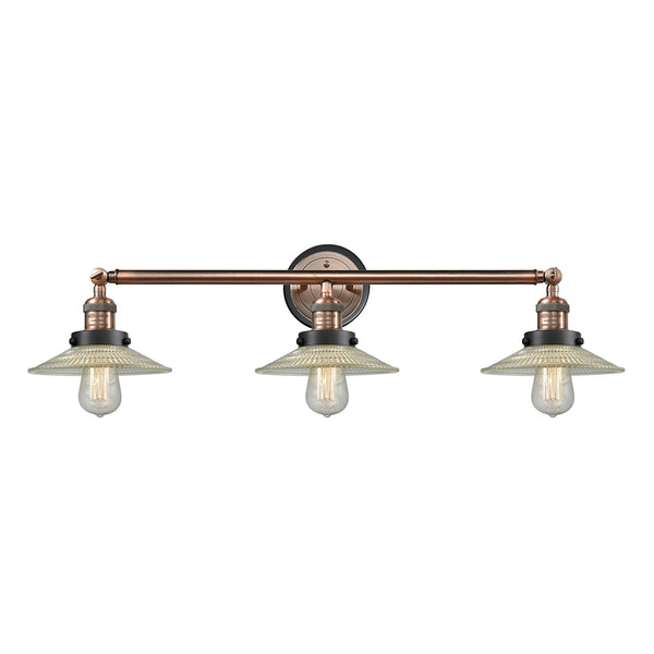Halophane Bath Vanity Light shown in the Antique Copper finish with a Clear Halophane shade