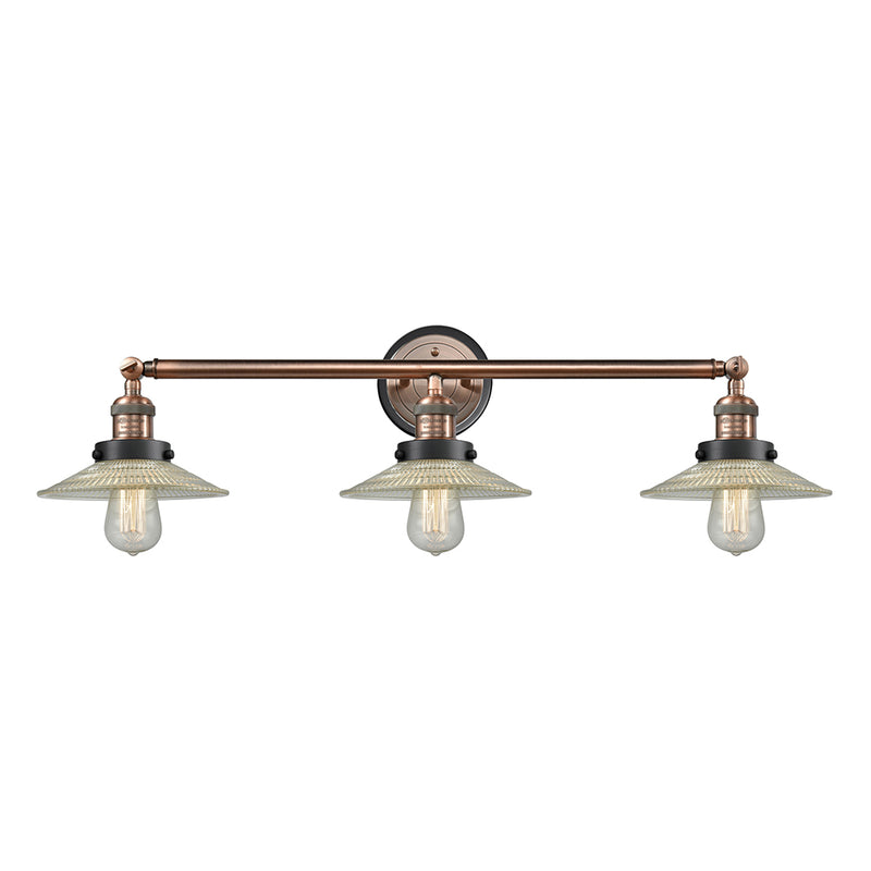 Halophane Bath Vanity Light shown in the Antique Copper finish with a Clear Halophane shade