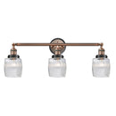Colton Bath Vanity Light shown in the Antique Copper finish with a Clear Halophane shade