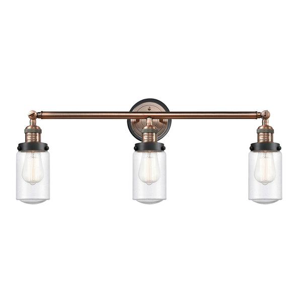 Dover Bath Vanity Light shown in the Antique Copper finish with a Seedy shade