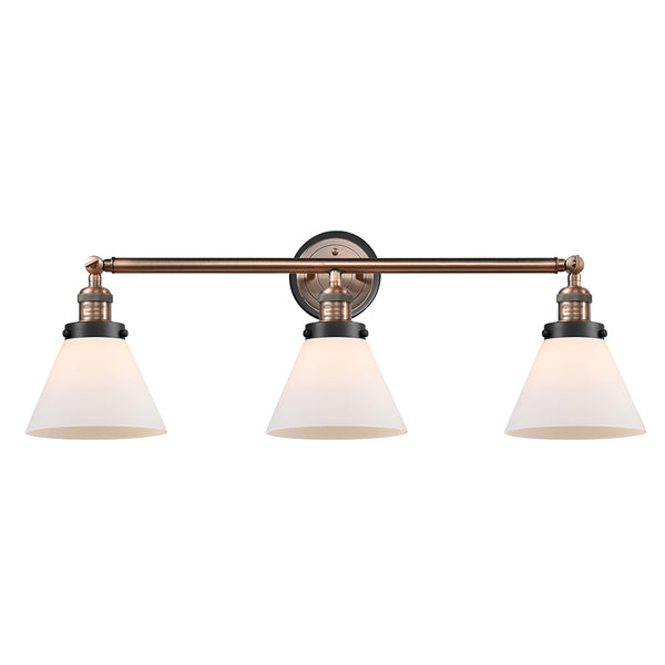 Cone Bath Vanity Light shown in the Antique Copper finish with a Matte White shade
