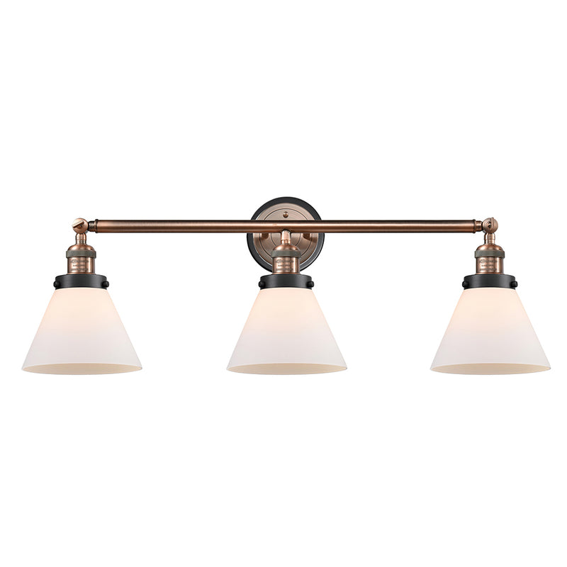 Cone Bath Vanity Light shown in the Antique Copper finish with a Matte White shade