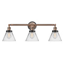 Cone Bath Vanity Light shown in the Antique Copper finish with a Clear shade
