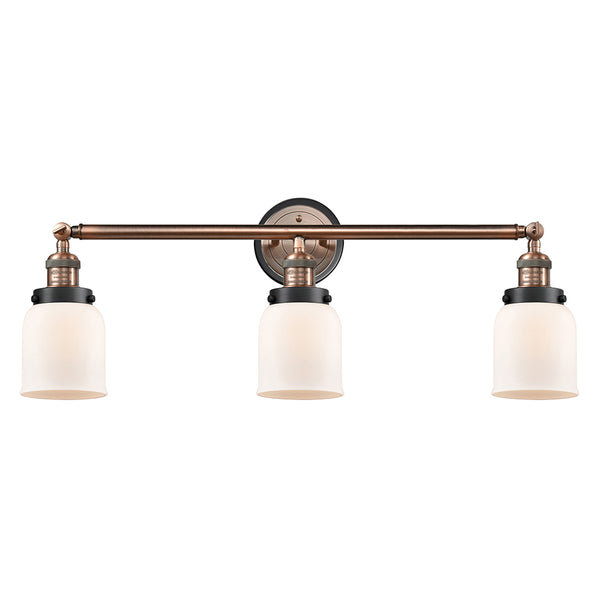 Bell Bath Vanity Light shown in the Antique Copper finish with a Matte White shade
