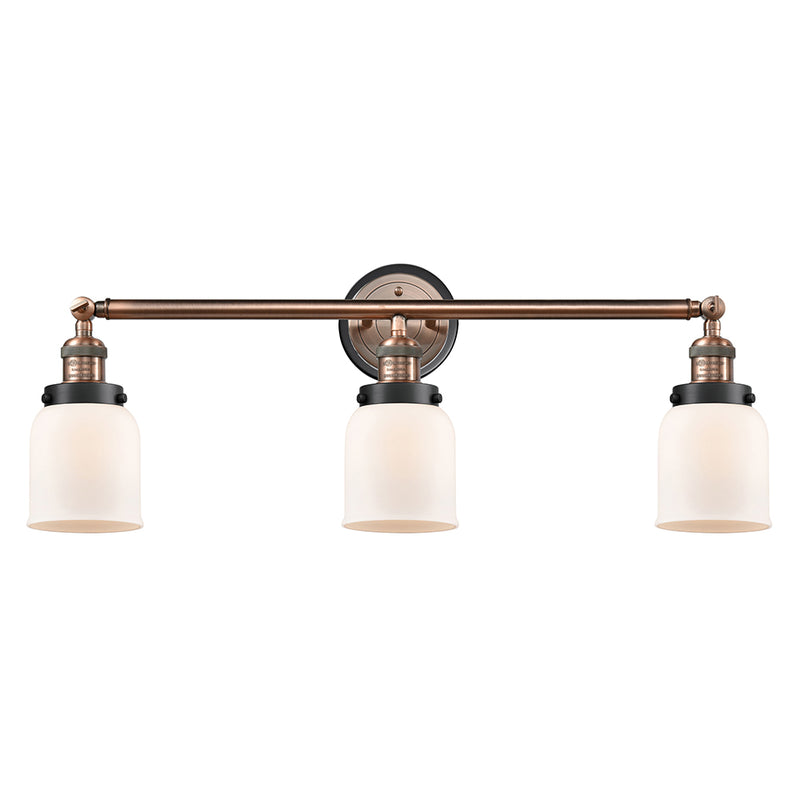 Bell Bath Vanity Light shown in the Antique Copper finish with a Matte White shade