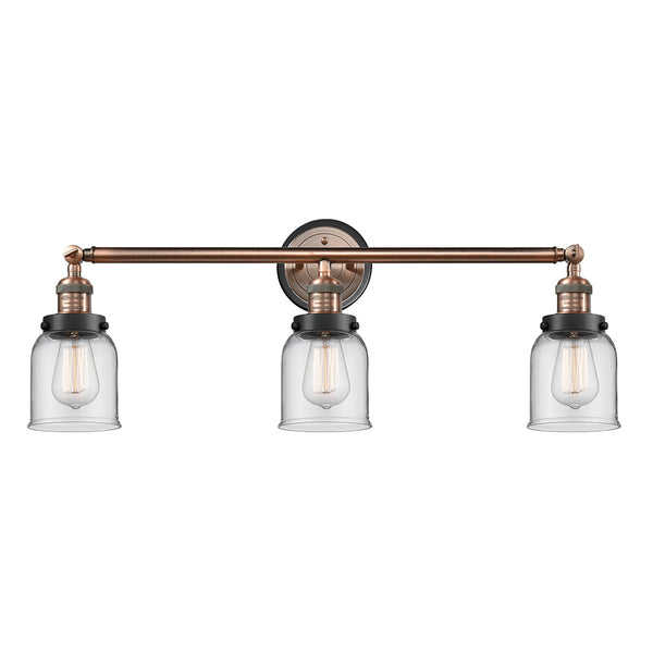 Bell Bath Vanity Light shown in the Antique Copper finish with a Clear shade