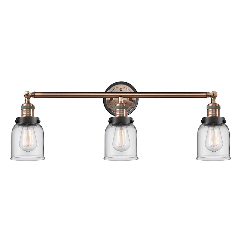 Bell Bath Vanity Light shown in the Antique Copper finish with a Clear shade