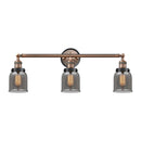 Bell Bath Vanity Light shown in the Antique Copper finish with a Plated Smoke shade