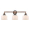 Bell Bath Vanity Light shown in the Antique Copper finish with a Matte White shade