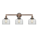 Bell Bath Vanity Light shown in the Antique Copper finish with a Clear shade
