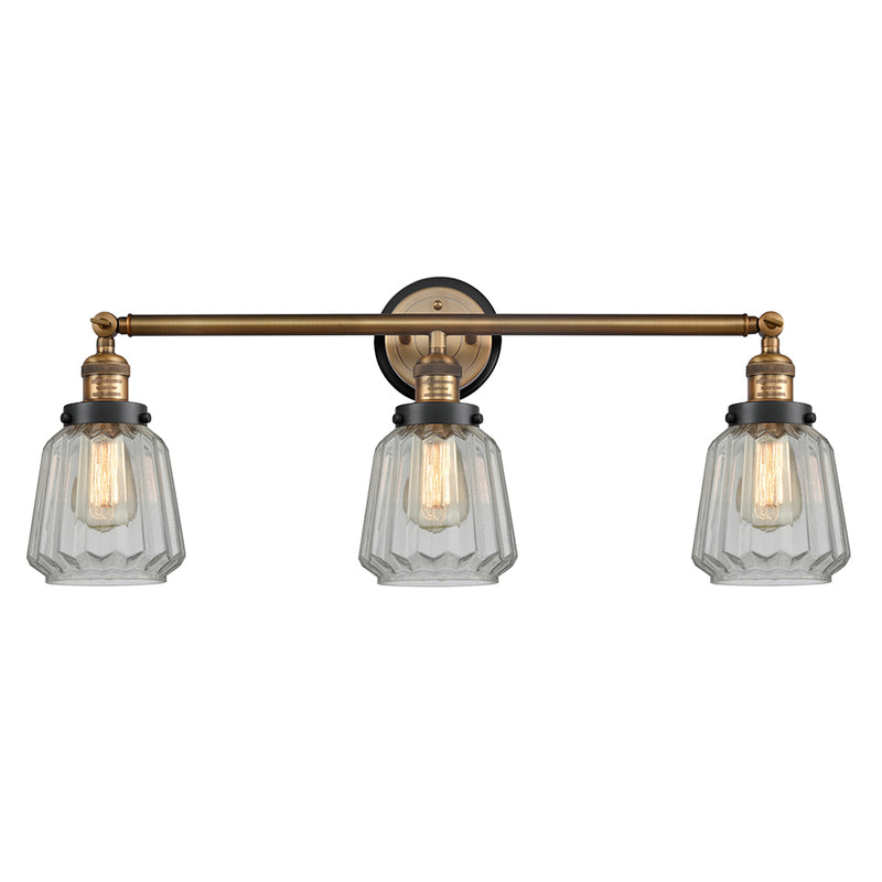 Chatham Bath Vanity Light shown in the Brushed Brass finish with a Clear shade