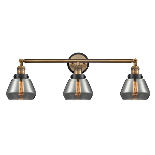 Fulton Bath Vanity Light shown in the Brushed Brass finish with a Plated Smoke shade