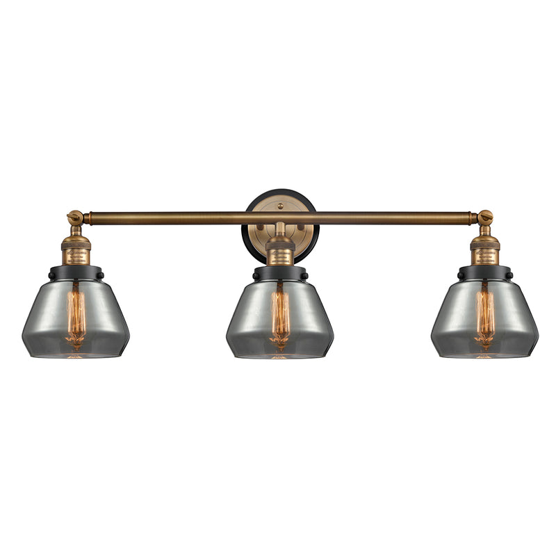 Fulton Bath Vanity Light shown in the Brushed Brass finish with a Plated Smoke shade