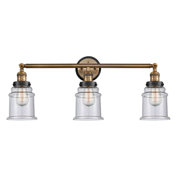 Canton Bath Vanity Light shown in the Brushed Brass finish with a Seedy shade