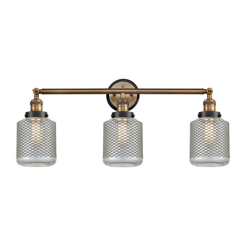 Stanton Bath Vanity Light shown in the Brushed Brass finish with a Clear Wire Mesh shade