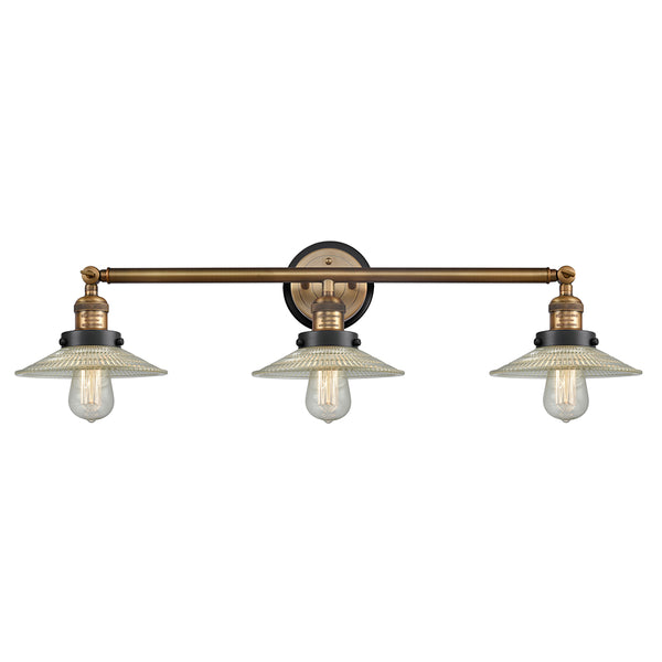 Halophane Bath Vanity Light shown in the Brushed Brass finish with a Clear Halophane shade