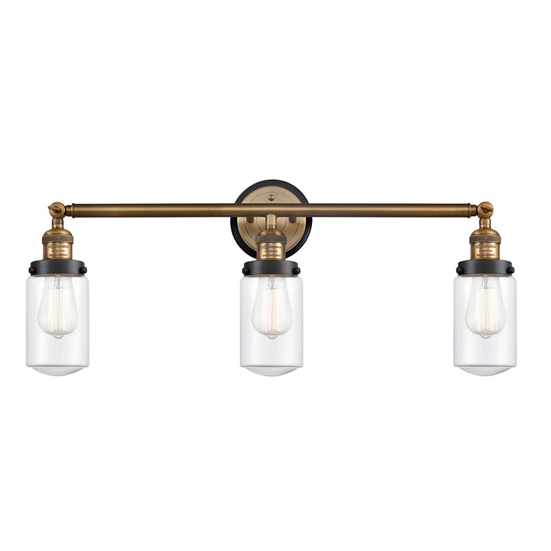Dover Bath Vanity Light shown in the Brushed Brass finish with a Clear shade