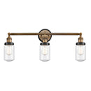 Dover Bath Vanity Light shown in the Brushed Brass finish with a Seedy shade