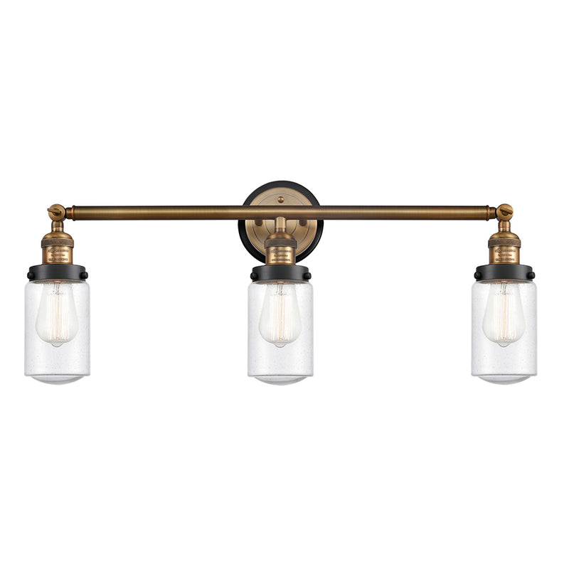 Dover Bath Vanity Light shown in the Brushed Brass finish with a Seedy shade