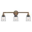 Bell Bath Vanity Light shown in the Brushed Brass finish with a Clear shade