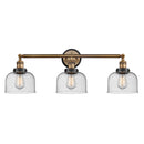 Bell Bath Vanity Light shown in the Brushed Brass finish with a Seedy shade