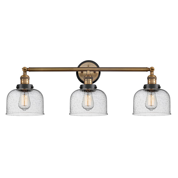 Bell Bath Vanity Light shown in the Brushed Brass finish with a Seedy shade