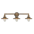 Railroad Bath Vanity Light shown in the Brushed Brass finish with a Antique Copper shade