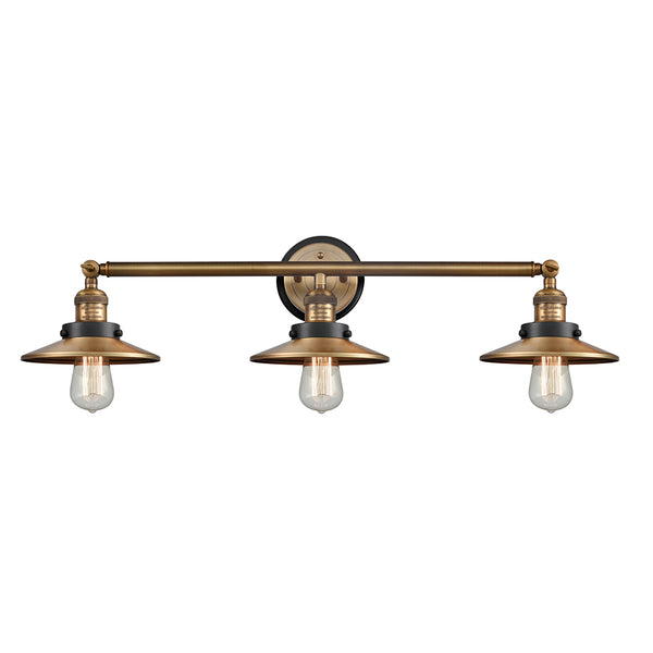 Railroad Bath Vanity Light shown in the Brushed Brass finish with a Antique Copper shade