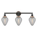 Geneseo Bath Vanity Light shown in the Matte Black finish with a Clear Crackled shade