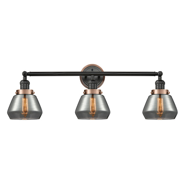 Fulton Bath Vanity Light shown in the Matte Black finish with a Plated Smoke shade