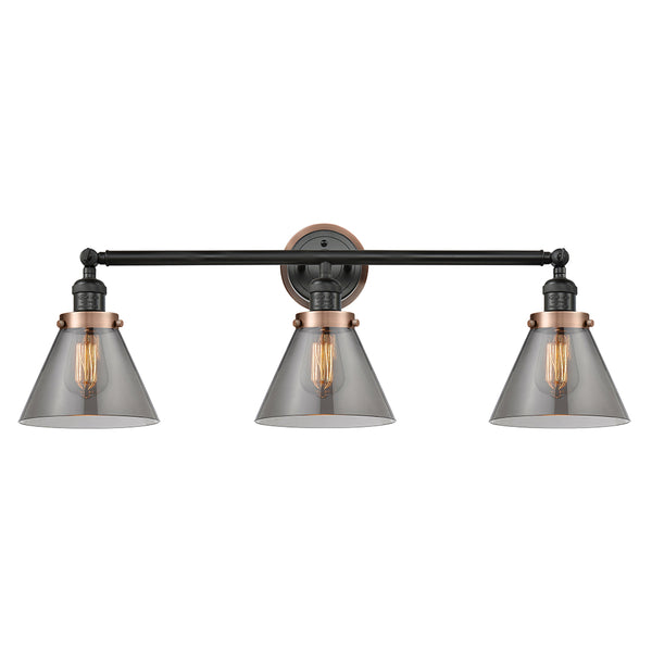 Cone Bath Vanity Light shown in the Matte Black finish with a Plated Smoke shade