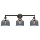 Bell Bath Vanity Light shown in the Matte Black finish with a Plated Smoke shade