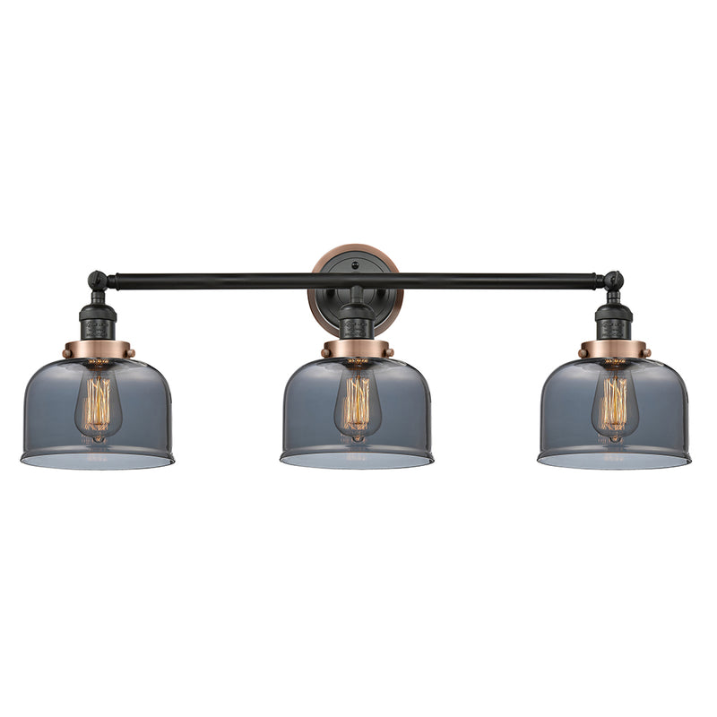 Bell Bath Vanity Light shown in the Matte Black finish with a Plated Smoke shade