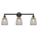 Chatham Bath Vanity Light shown in the Matte Black finish with a Clear shade