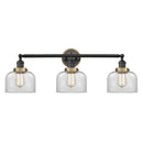 Bell Bath Vanity Light shown in the Matte Black finish with a Clear shade