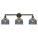 Bell Bath Vanity Light shown in the Matte Black finish with a Plated Smoke shade