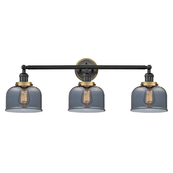 Bell Bath Vanity Light shown in the Matte Black finish with a Plated Smoke shade