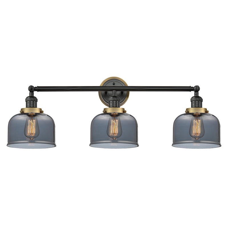Bell Bath Vanity Light shown in the Matte Black finish with a Plated Smoke shade