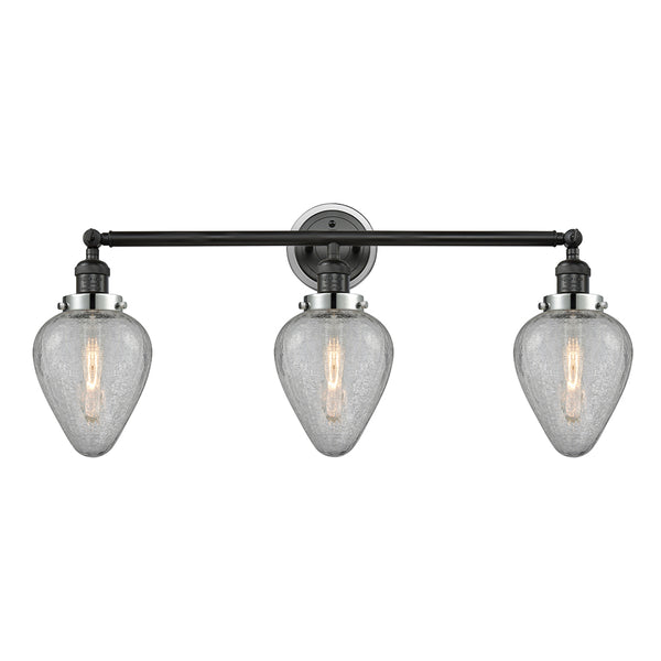 Geneseo Bath Vanity Light shown in the Matte Black finish with a Clear Crackled shade