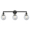 Beacon Bath Vanity Light shown in the Matte Black finish with a Seedy shade