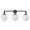 Beacon Bath Vanity Light shown in the Matte Black finish with a Seedy shade