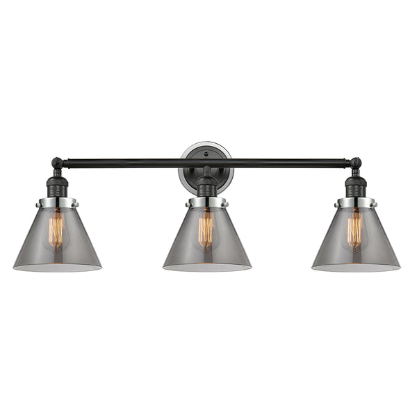 Cone Bath Vanity Light shown in the Matte Black finish with a Plated Smoke shade