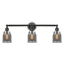 Bell Bath Vanity Light shown in the Matte Black finish with a Plated Smoke shade