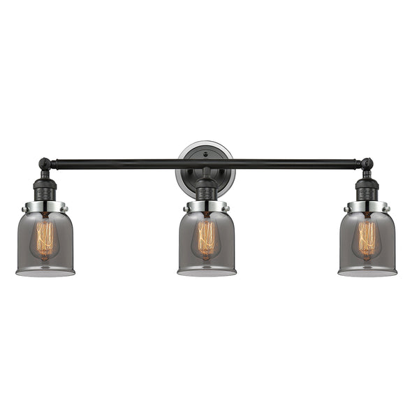 Bell Bath Vanity Light shown in the Matte Black finish with a Plated Smoke shade