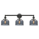 Bell Bath Vanity Light shown in the Matte Black finish with a Plated Smoke shade