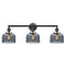 Bell Bath Vanity Light shown in the Matte Black finish with a Plated Smoke shade