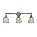 Chatham Bath Vanity Light shown in the Antique Copper finish with a Clear shade
