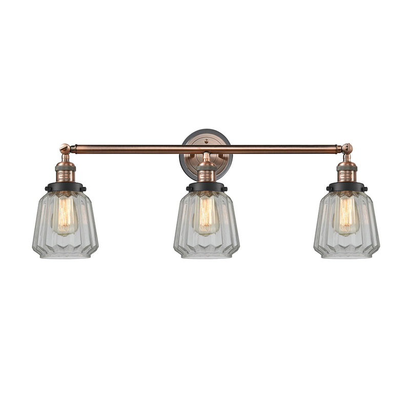 Chatham Bath Vanity Light shown in the Antique Copper finish with a Clear shade