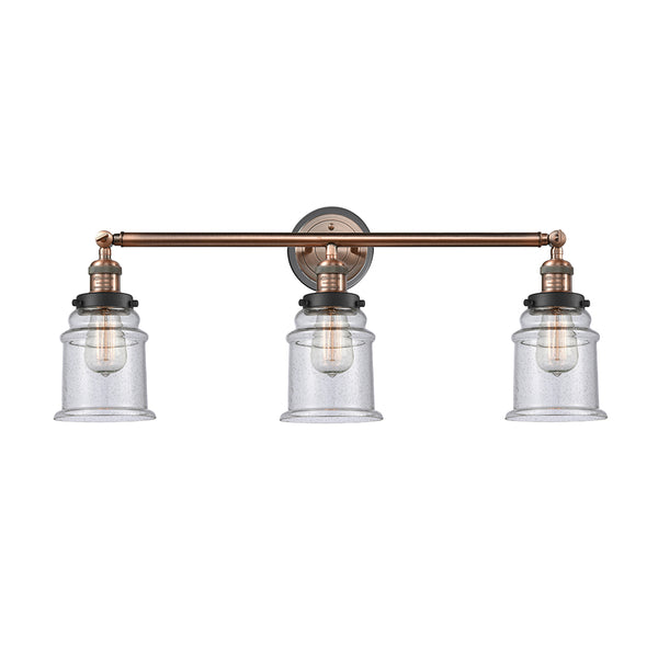 Canton Bath Vanity Light shown in the Antique Copper finish with a Seedy shade